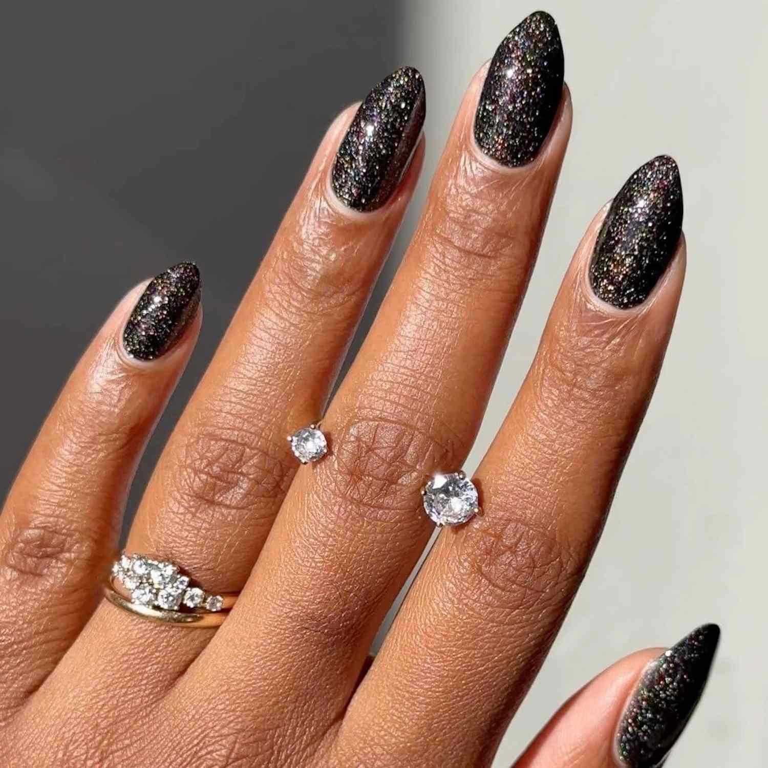 15 Matte Black Coffin Nails with Silver Designs