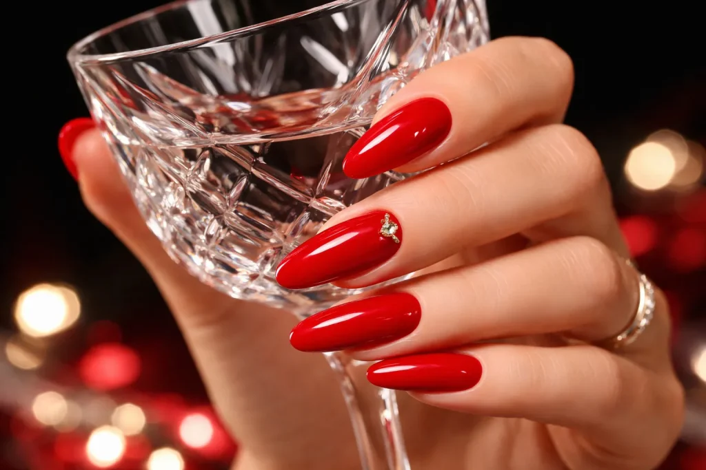 High-gloss bold red party nails for a confident birthday look